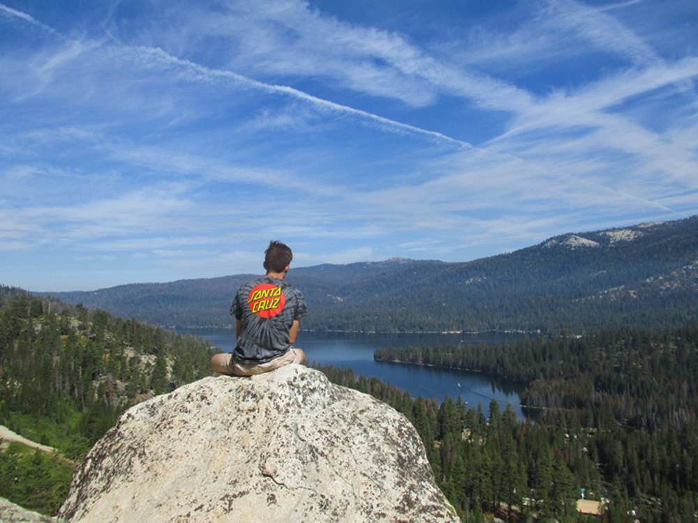 A camper at a summer camp in the mountains of California